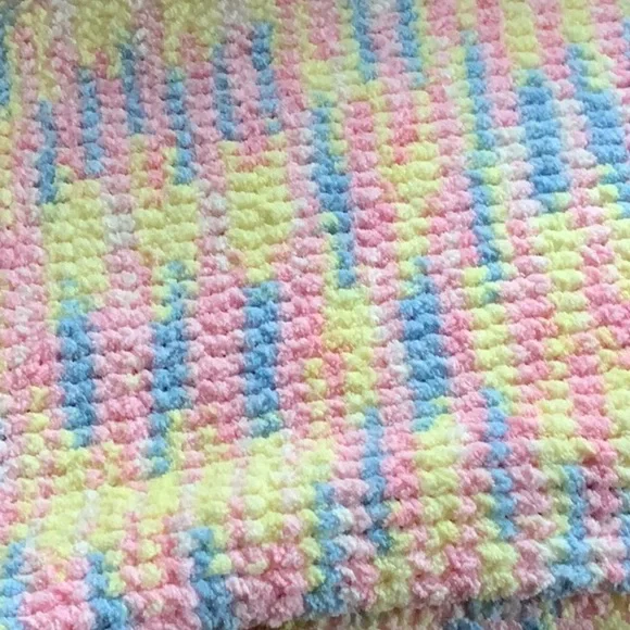 White handmade, multicolored, vibrant, soft, comfortable blanket